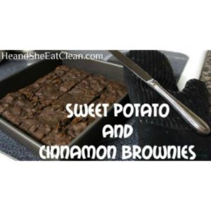 pan of cut brownies with a knife and oven mitt on the side