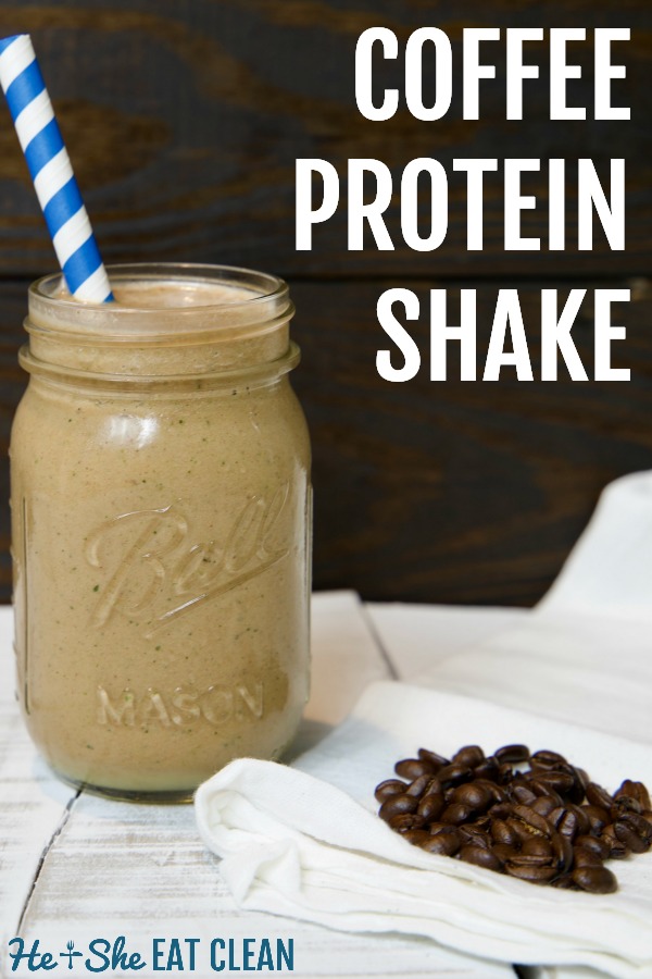 protein shake in a glass jar on a white table with coffee beans