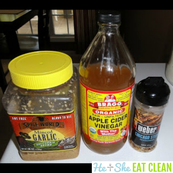 ingredients for Zesty Grilled Chicken including garlic, apple cider vinegar, and seasoning