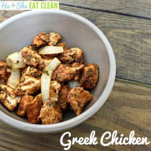 Greek chicken nuggets in a beige bowl on a wooden table
