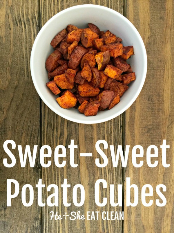 sweet potato cubes in a white bowl on a wooden table long pin