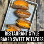 4 cut sweet potatoes on a cookie sheet with butter on top on a wooden table