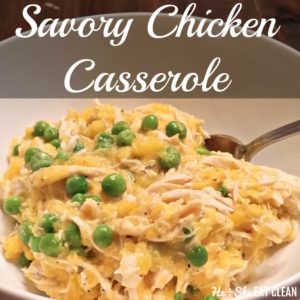 chicken, butternut squash, and green peas in a white bowl with a spoon with text that reads Savory Chicken Casserole
