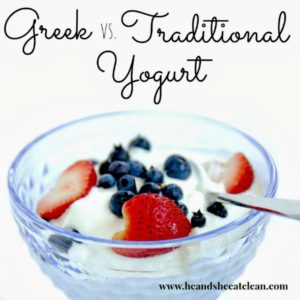 bowl of Greek yogurt topped with strawberries and blueberries with text that reads Greek vs Traditional Yogurt square image
