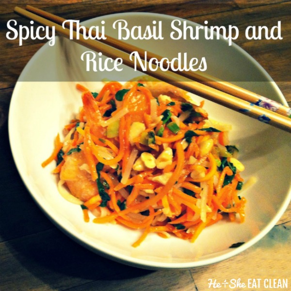 spicy thai basil shrimp and rice noodles in a white bowl with two wooden chopsticks on top
