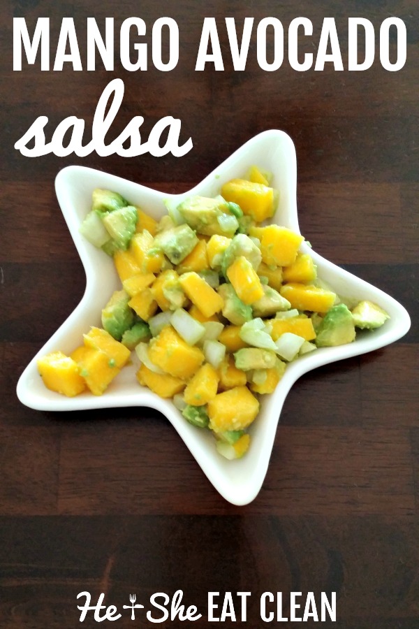 mango avocado salsa in a white star shaped plate on a wooden table