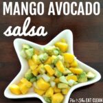 mango avocado salsa in a white star shaped plate on a wooden table square image