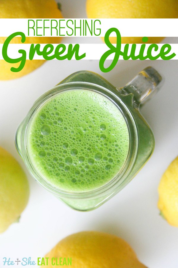 green juice in a clear glass with lemons on a white tabletop with text that reads refreshing green juice