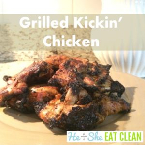 grilled chicken thighs piled on a beige plate with text that reads grilled kickin chicken square image