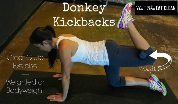 female in a gym doing donkey kickbacks
