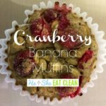 one cranberry banana muffin in a white paper muffin cup