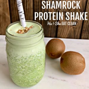 Shamrock Green Protein Shake on white marble with two kiwi fruits