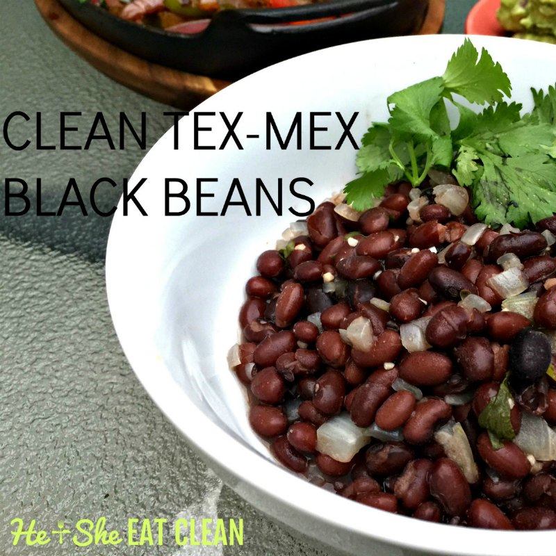 white bowl with black beans and cilantro on top