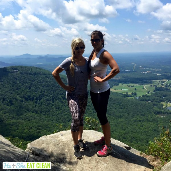 two females standing on top of a mountain - Yonah Mountain