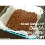 pan of chocolate protein bars lined with parchment paper