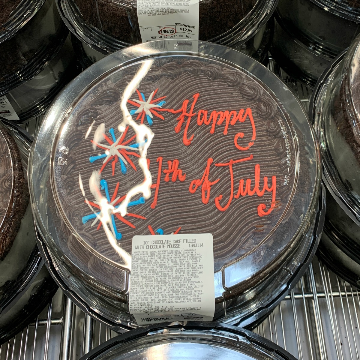 chocolate cake from Costco that reads Happy 4th of July with fireworks