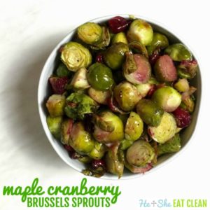 Maple Cranberry Brussels Sprouts in a white bowl on a white background