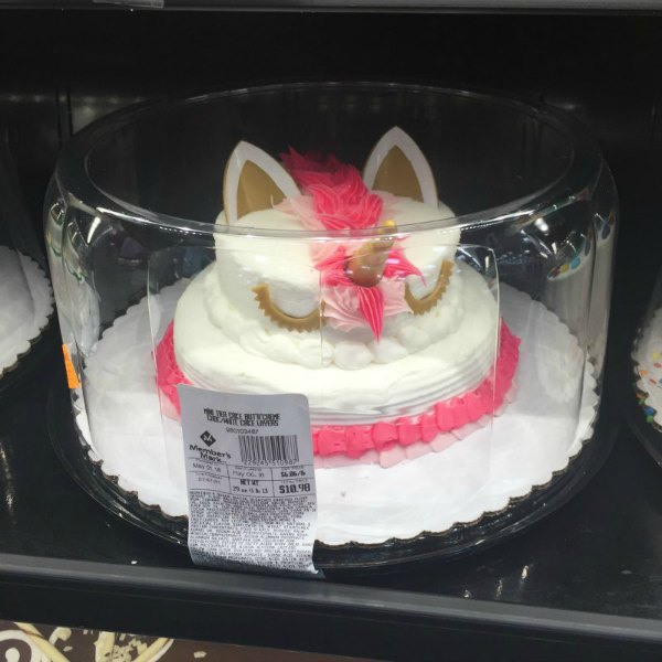 pink unicorn small two tier cake from Sam's Club white cake with pink icing