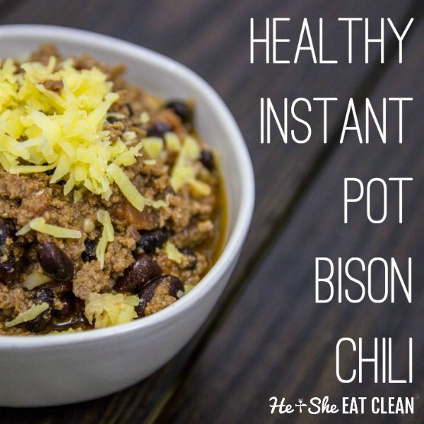 bowl of chili in a white bowl on a wooden table with text that reads healthy instant pot bison chili