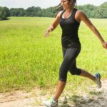 woman running with text that reads workout plans in blue text
