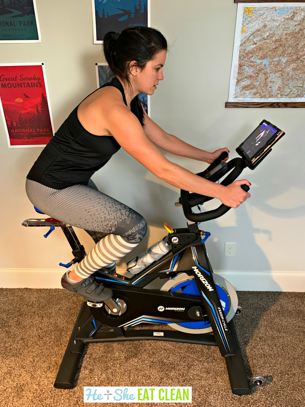 female using the Horizon Fitness indoor spinning bike