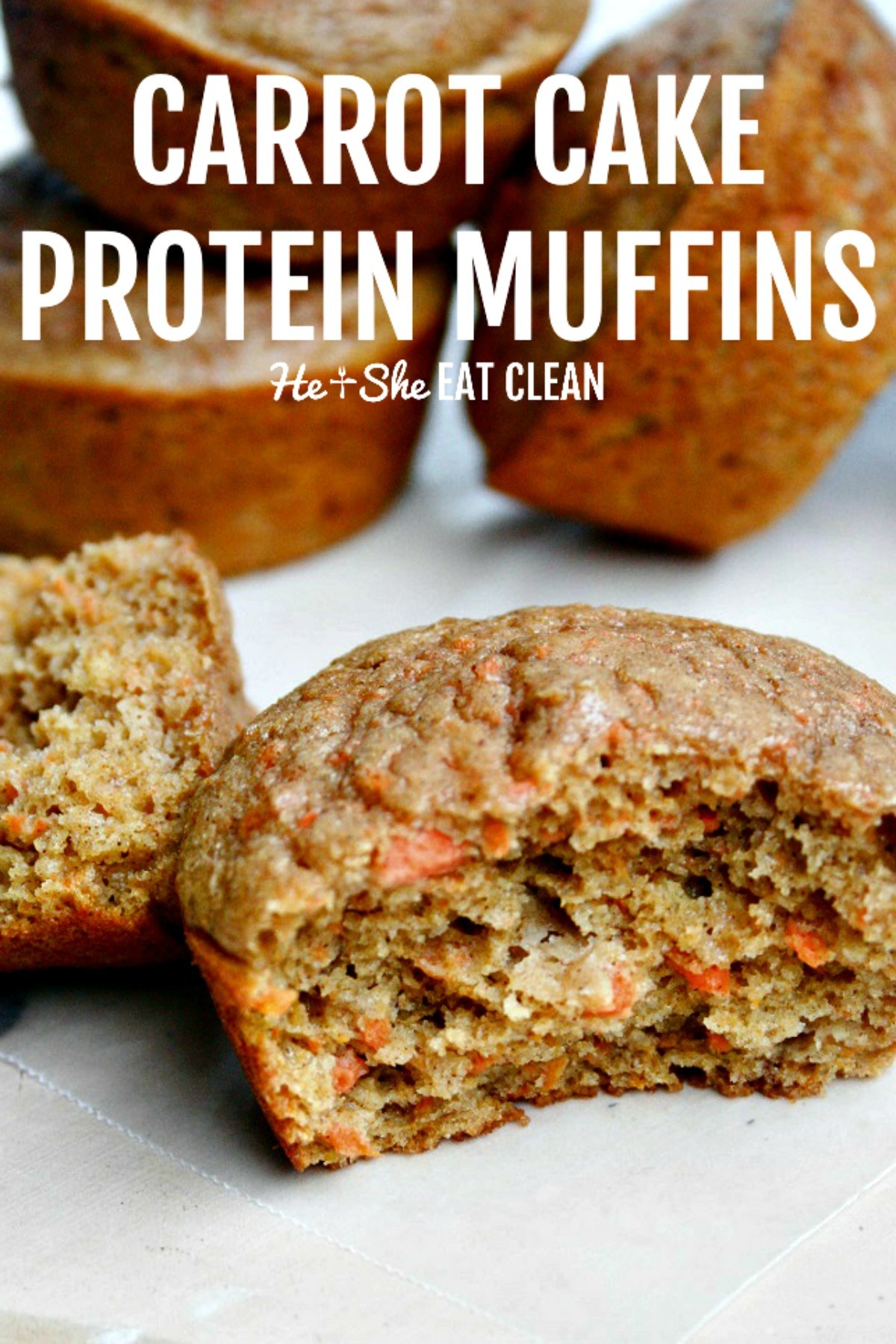 3 carrot cake protein muffins on a white tabletop