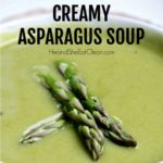 asparagus soup topped with 3 asparagus spears