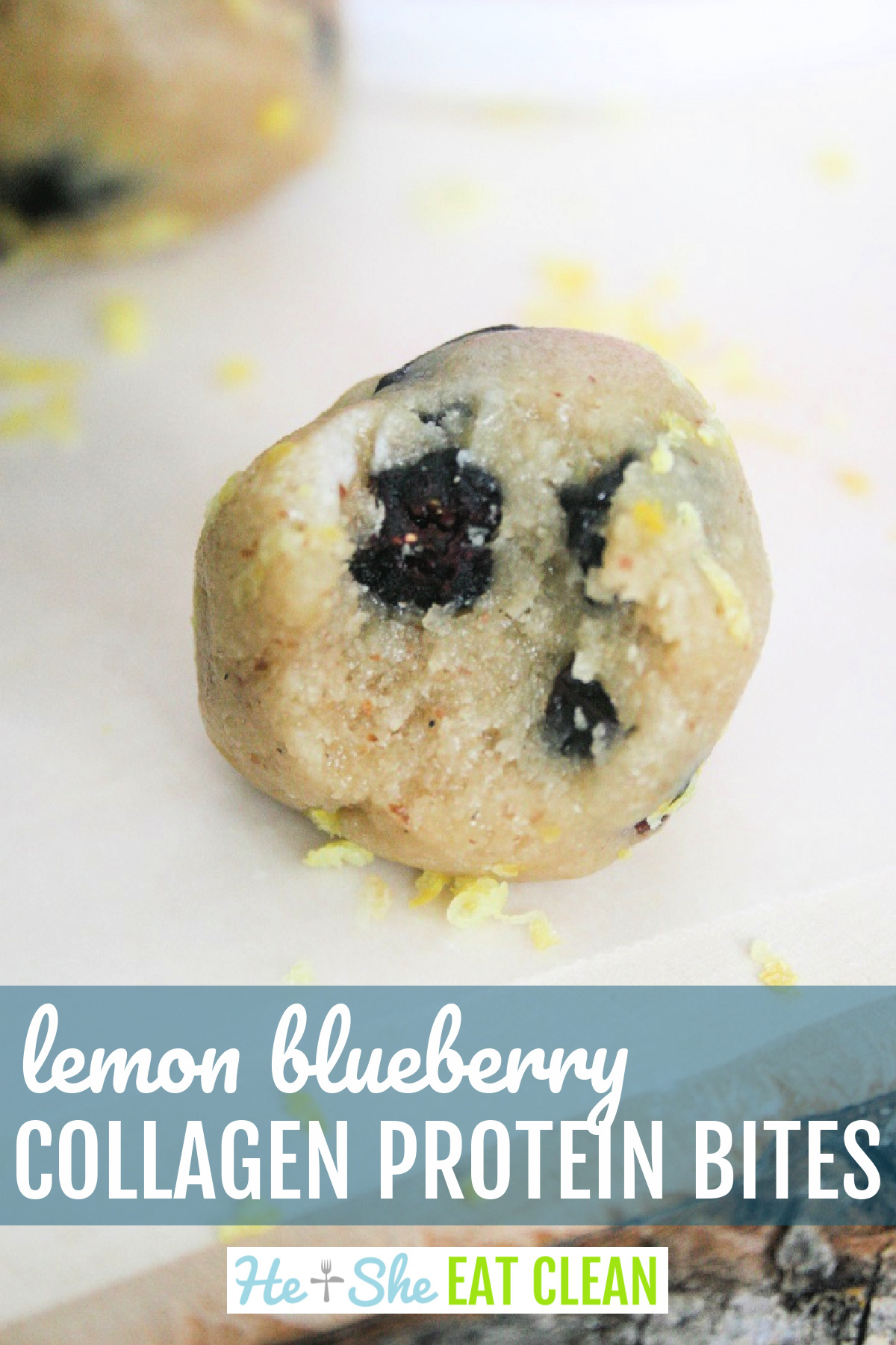 close up of protein bite/balls with blueberries inside and lemon zest around the bites