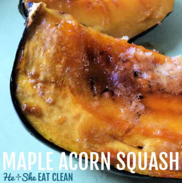 close up of a slice of acorn squash with butter and maple syrup on top