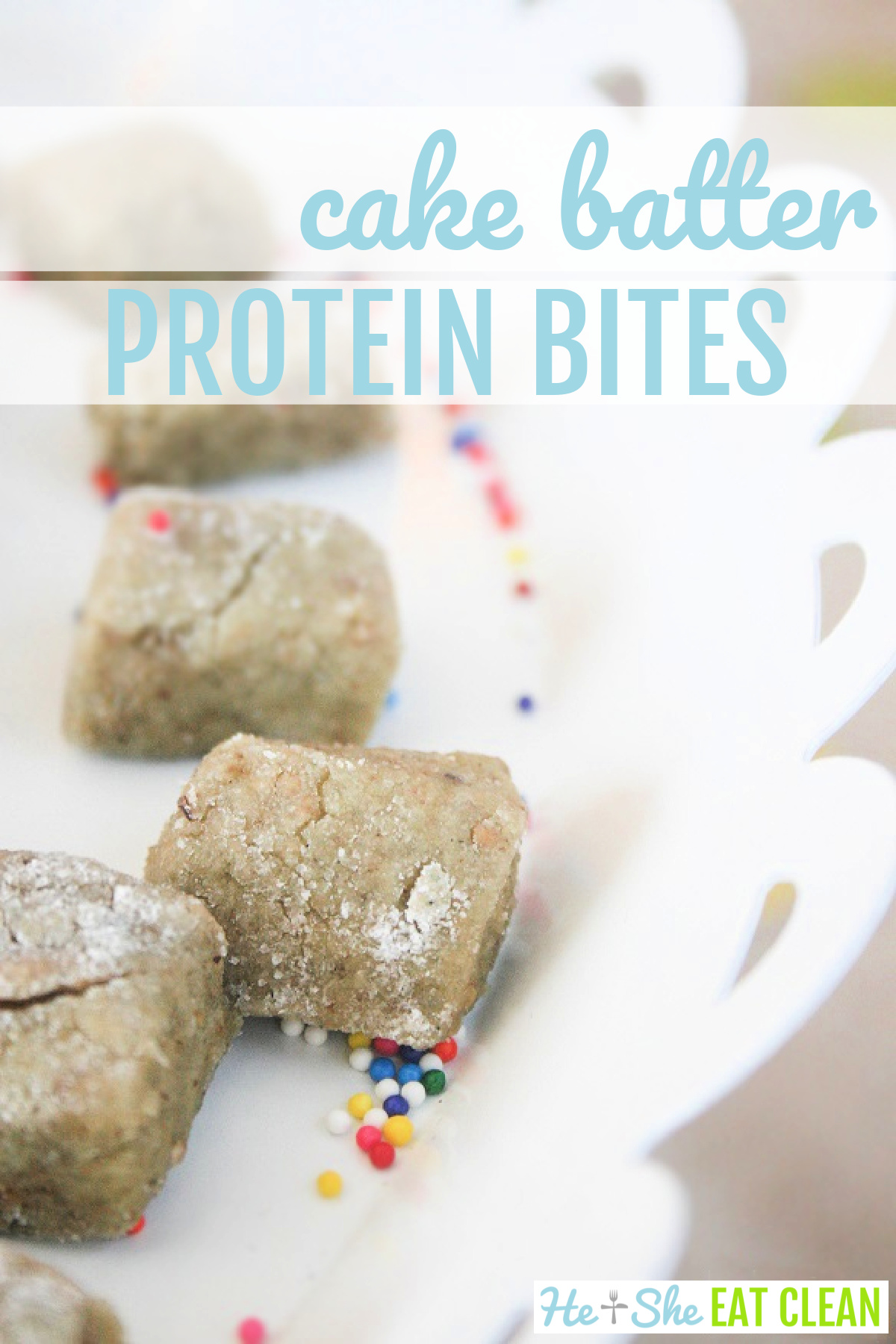 5 protein bites lined up on a white plate with sprinkles on top